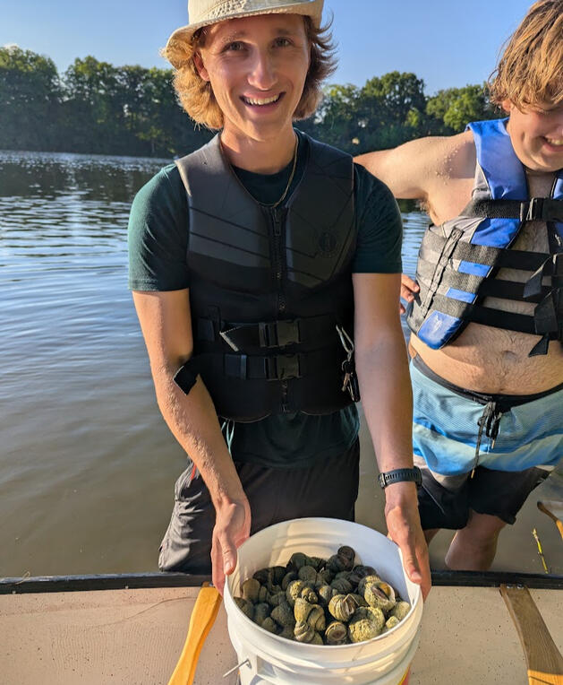 Removing Invasive Snails, Cambride, ON.